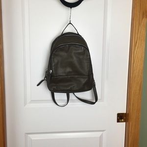 Leather back pack dark green by Margot
